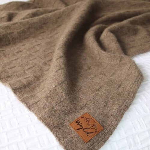 Brown wool knit blanket with basket weave pattern.