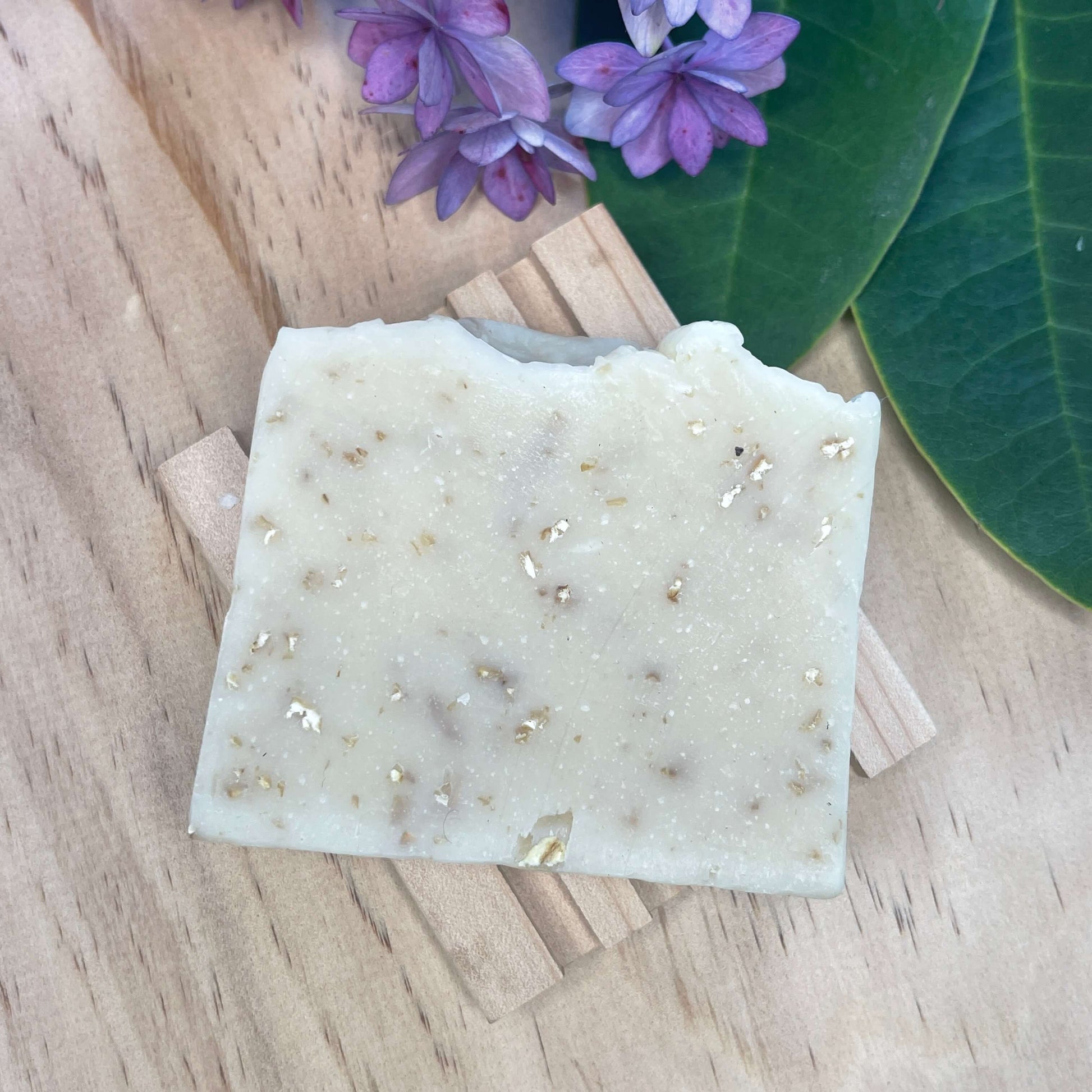 Natural soap on a wooden soap rack.