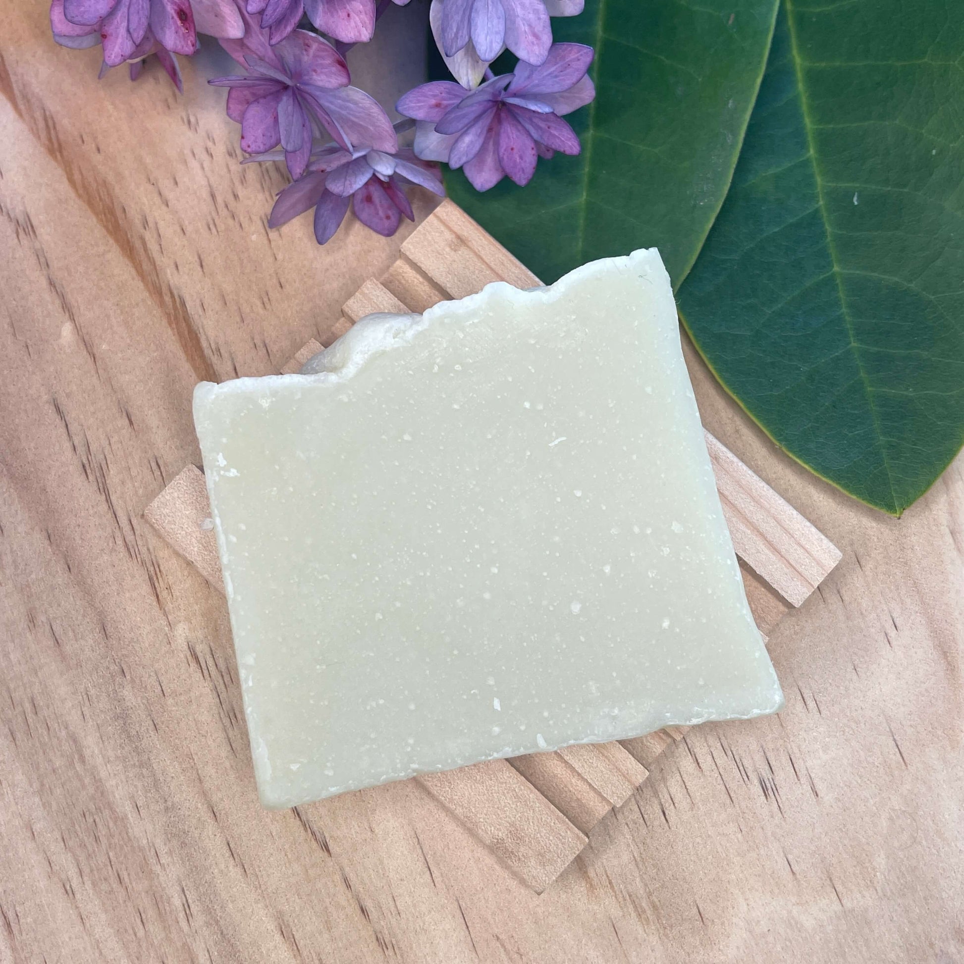 Natural soap on a wooden soap rack.