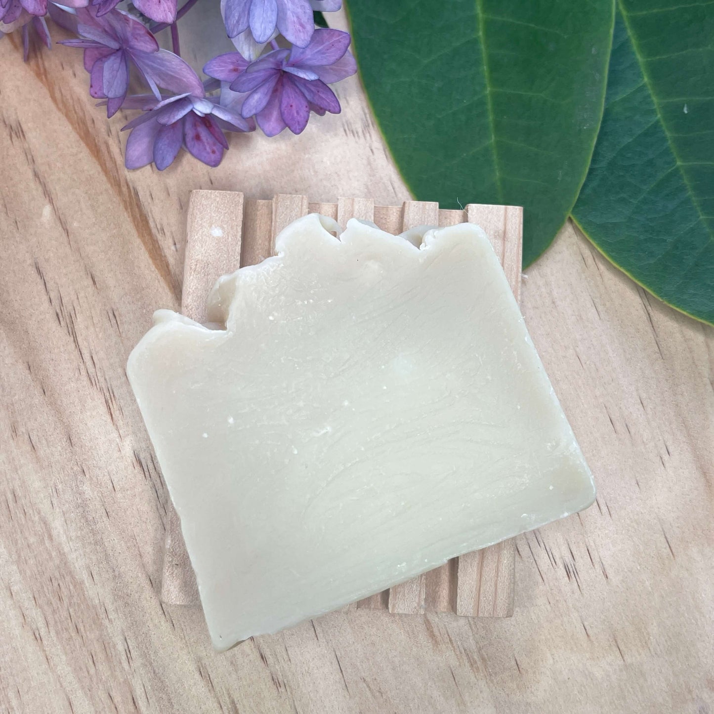 Natural soap on a wooden soap rack.