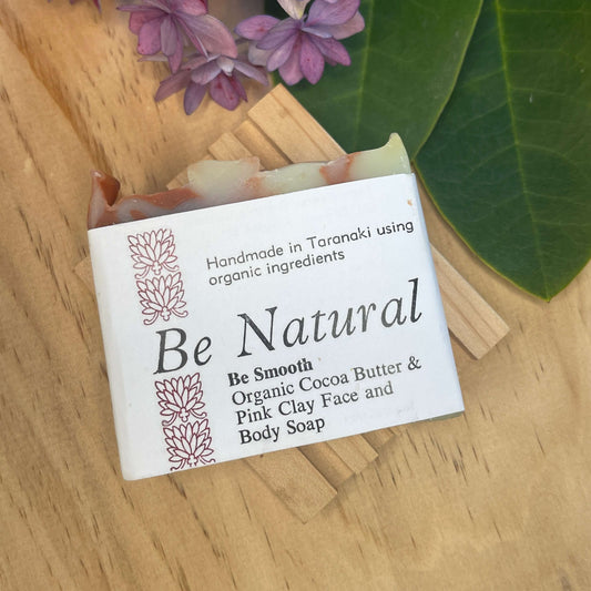 Natural soap bar on a wooden soap rack.