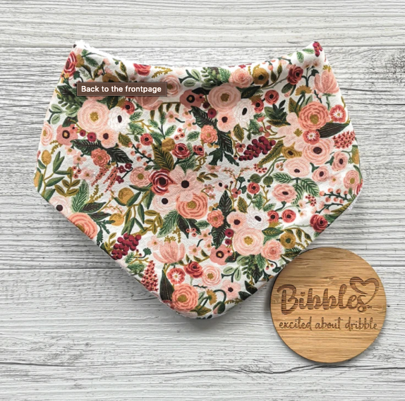 Pretty pink, peach, maroon and green floral dribble bibs for babies made by Bibbles.