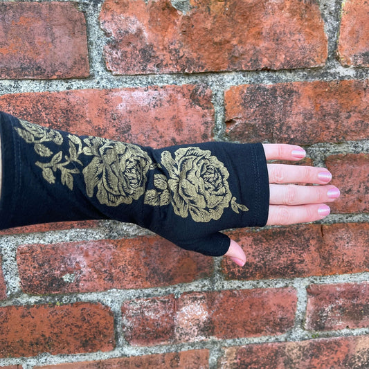 Fingerless merino gloves in black with gold roses.