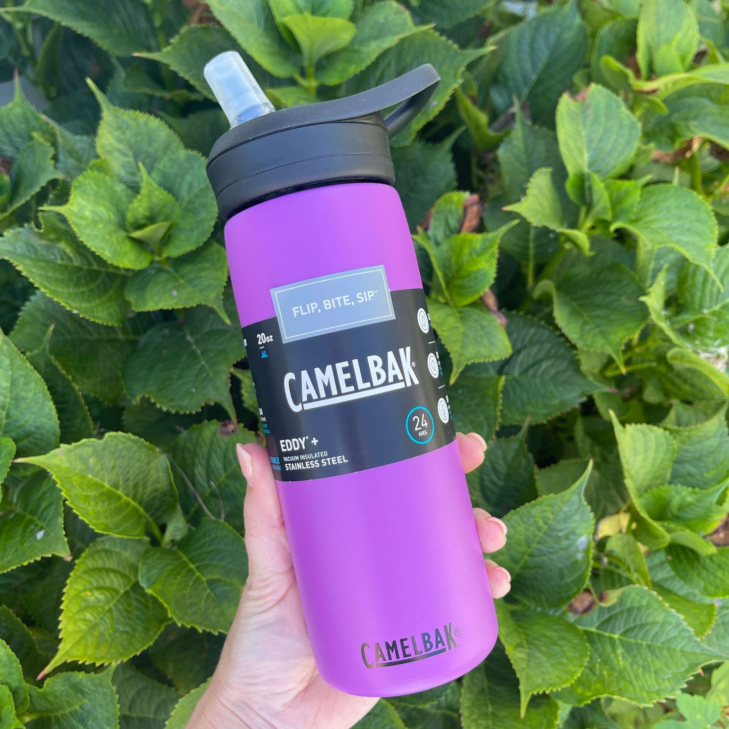 Stainless steel camelbak drink bottle in magenta pink.