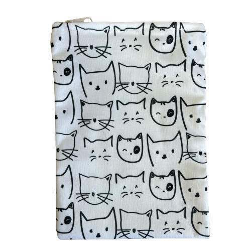 White reusable bag with black cat faces print.