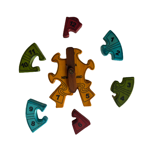 Childrens wooden clock puzzle in 4 different colours.