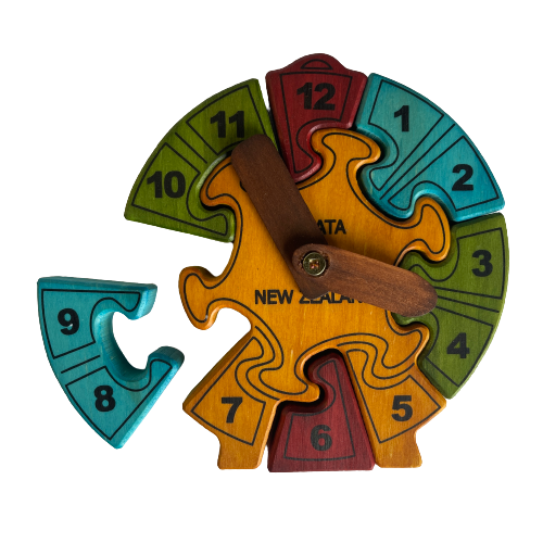 Childrens wooden clock puzzle in 4 different colours.