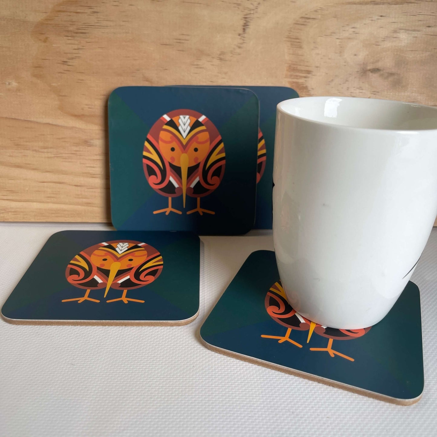 Set of coasters with Maori designed Kiwi bird on them.