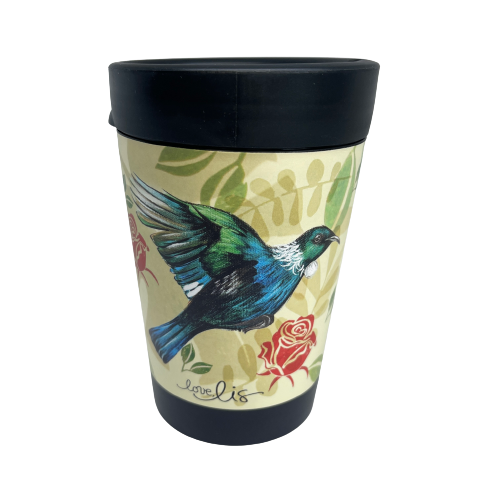 Black reusable coffee cup with beige and green leaf patterned wrap featuring the New Zealand Tui bird and red roses.