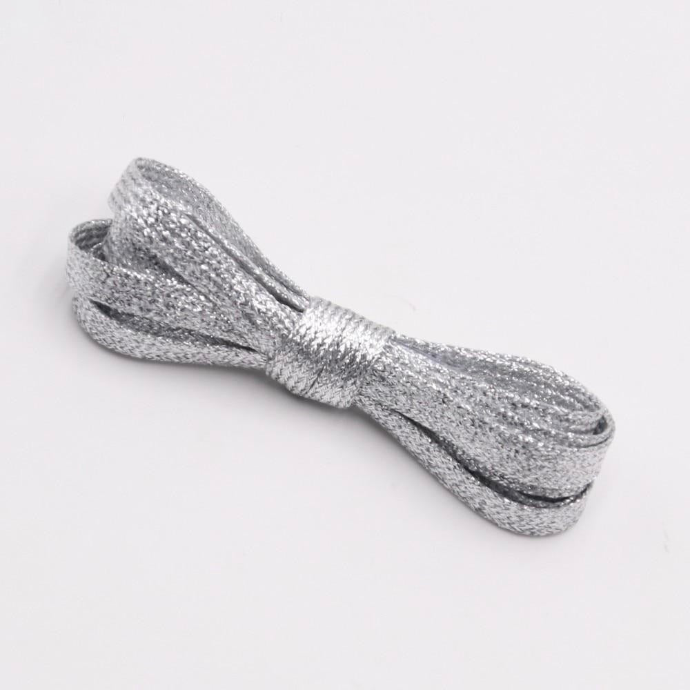Silver metallic shoelaces.