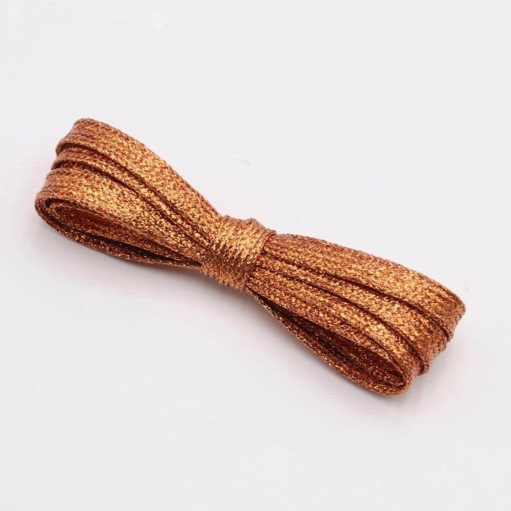 Orange metallic shoelaces.