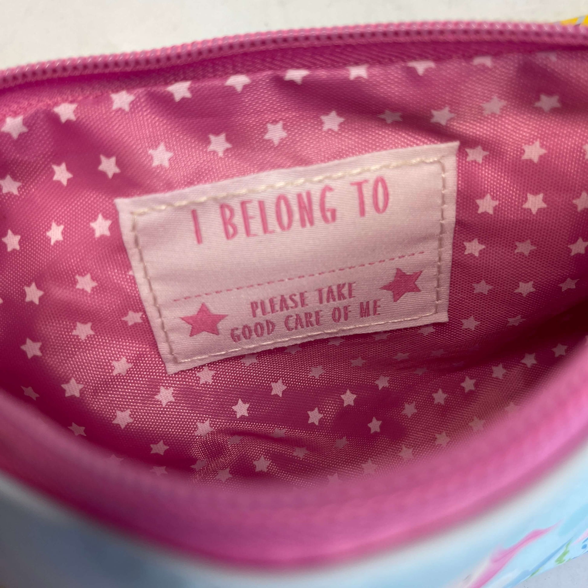 I belong to label sewn inside kids pencil case.