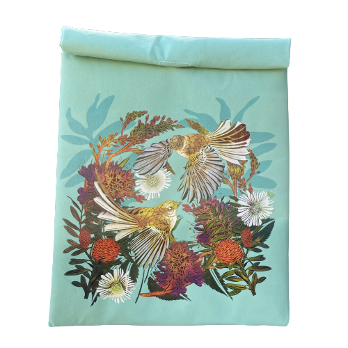 A light blue folding paper style lunch bag with floral and bird design.