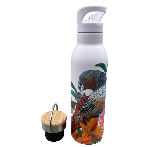 White stainless drink bottle featuring artwork of a Kaka bird and flowers. Bottle has a white sipper top but next to it is a bamboo screw top lid alternative.