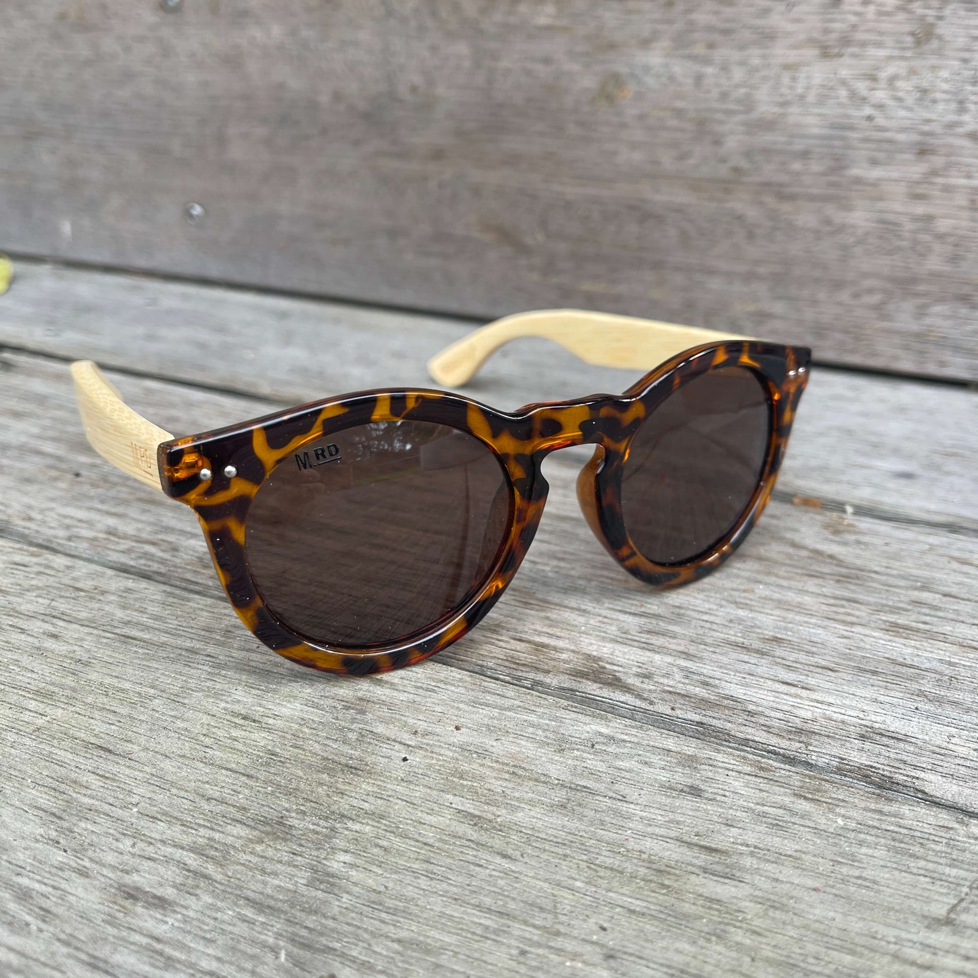 Womens sunglasses with brown tortoiseshell frames and bamboo arms in a Grace Kelly style.