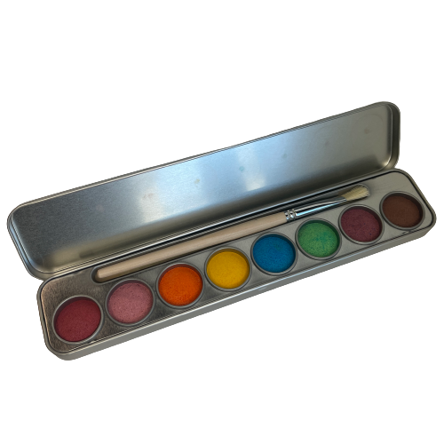 Watercolour paints in a tin with a paint brush.