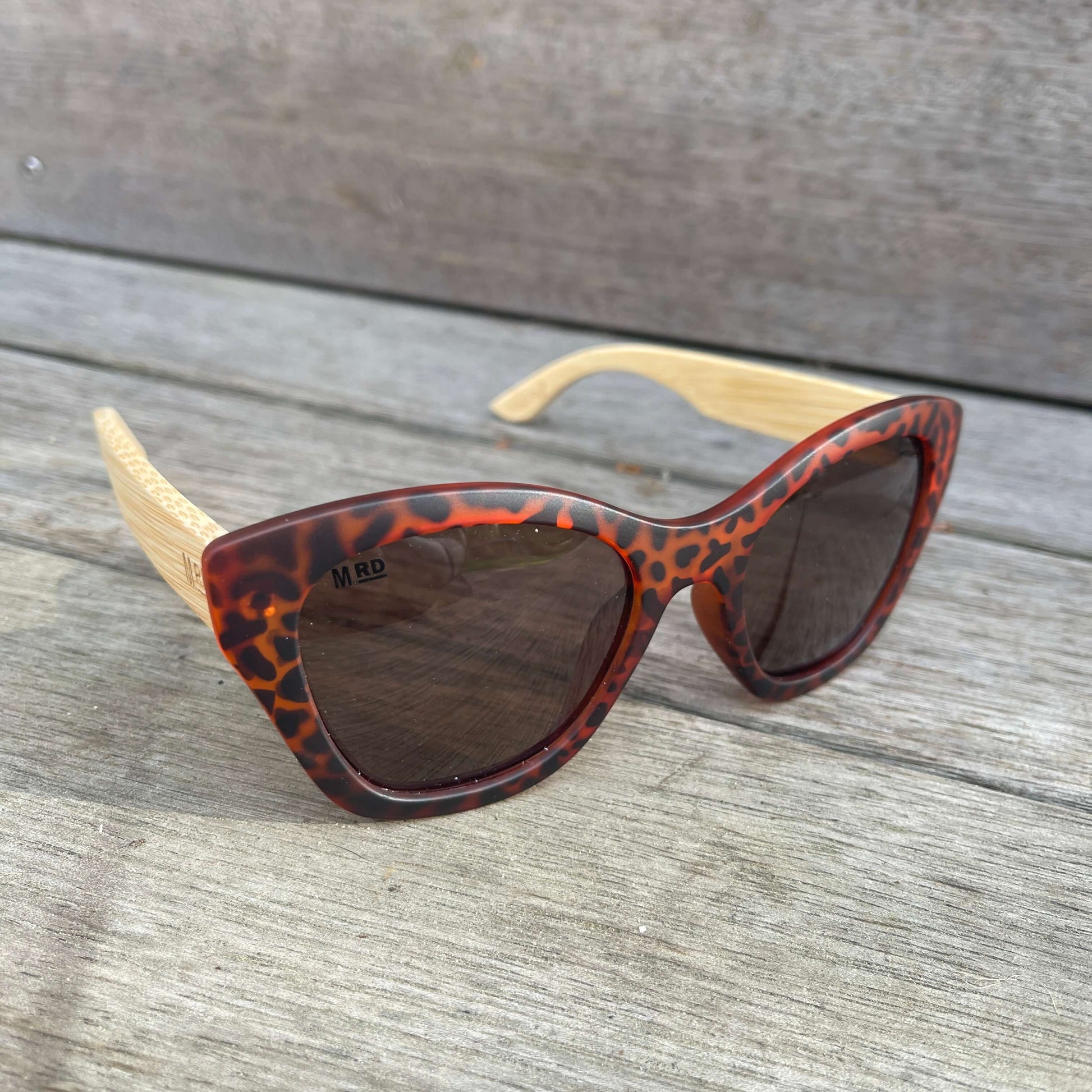 Womens sunglasses with tortoiseshell frame and bamboo arms.