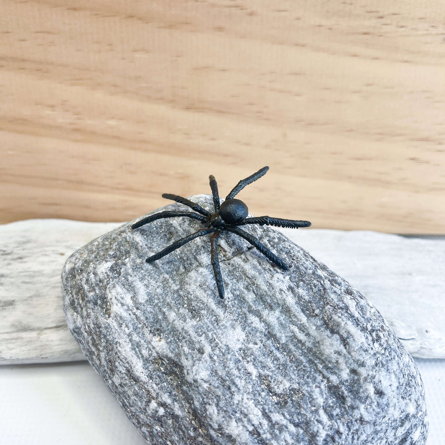 Mini spider figurine.