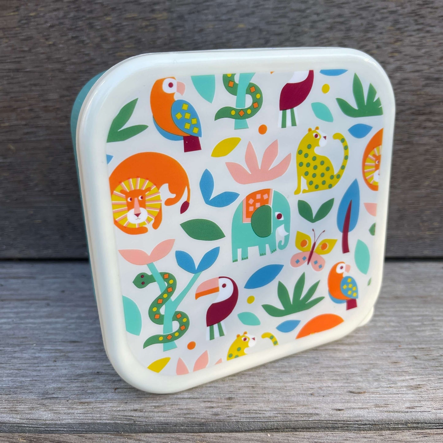 Trio of snack boxes featuring jungle animals on the lids.