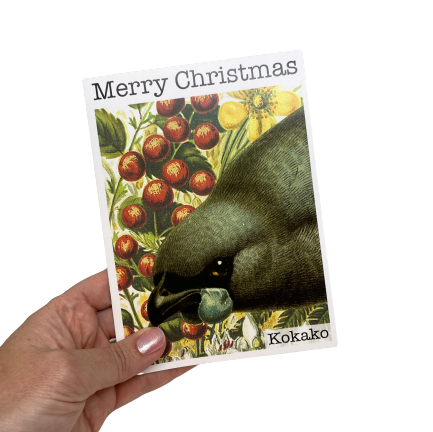Christmas card with a Kokako bird and flowers.