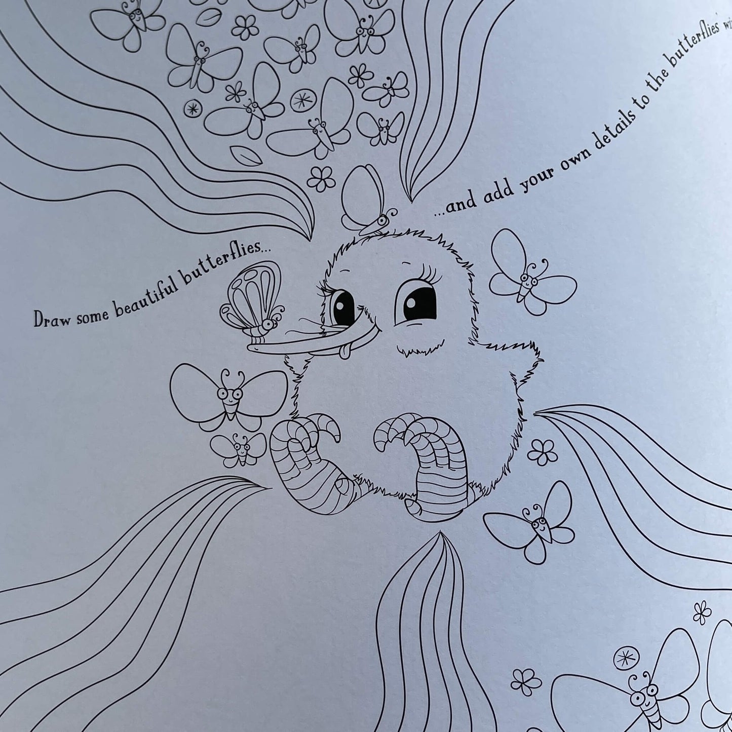 Page from Kuwis Creative colouring book by Kat Merewether.