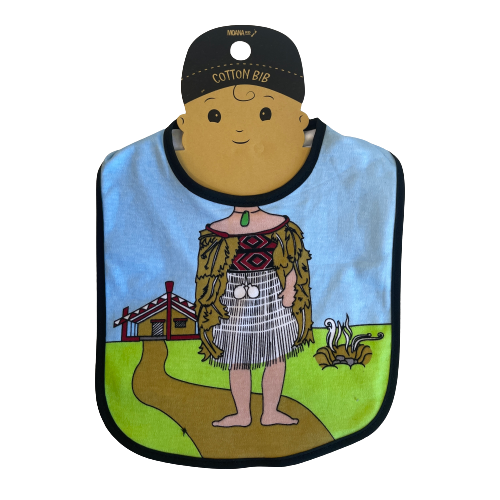 Baby bib with a maori wahine body and marae in the background.