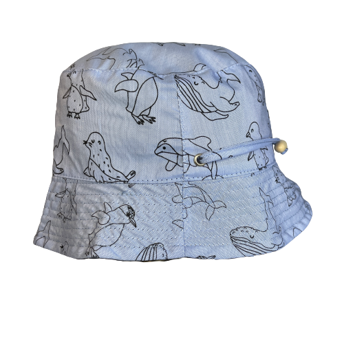 Bucket hat in denim blue with animal outlines in black.