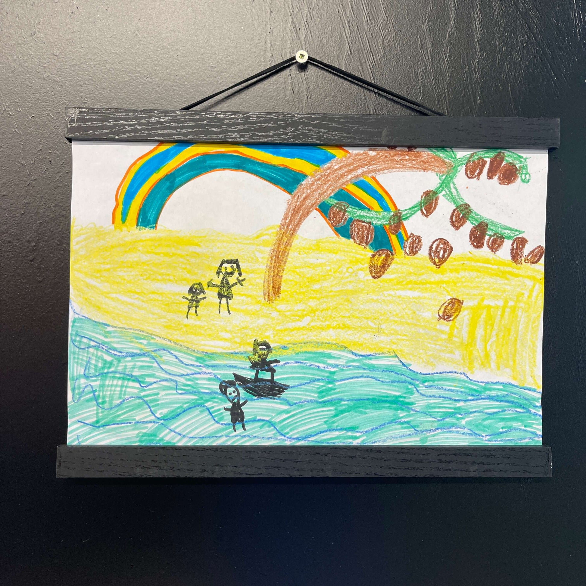 Wooden magnet picture frame in black.