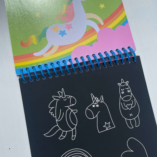 Scratch activity book featuring unicorns and magical world creatures.