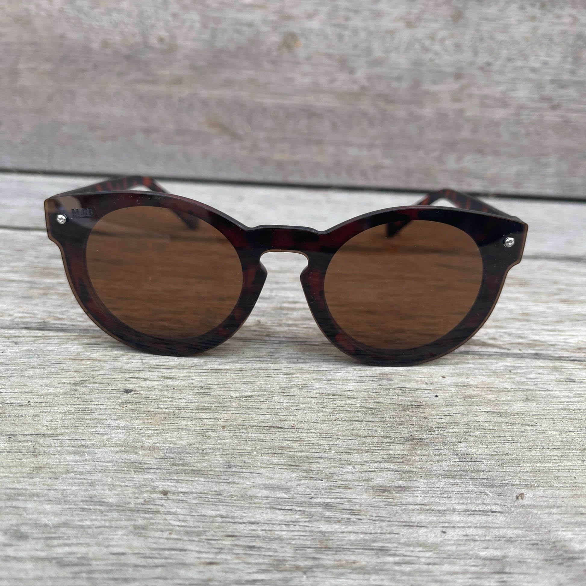Womens sunglasses with tortoiseshell frames.