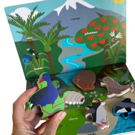 Wooden animals and puzzle mats featuring New Zealand flora, fauna and animals.