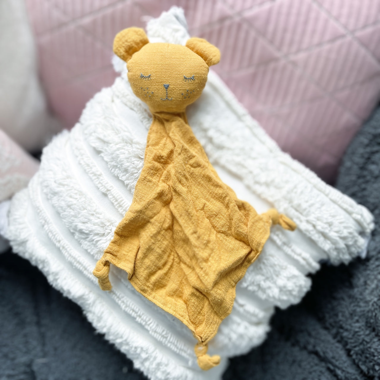 Mustard bear comforter baby toy.