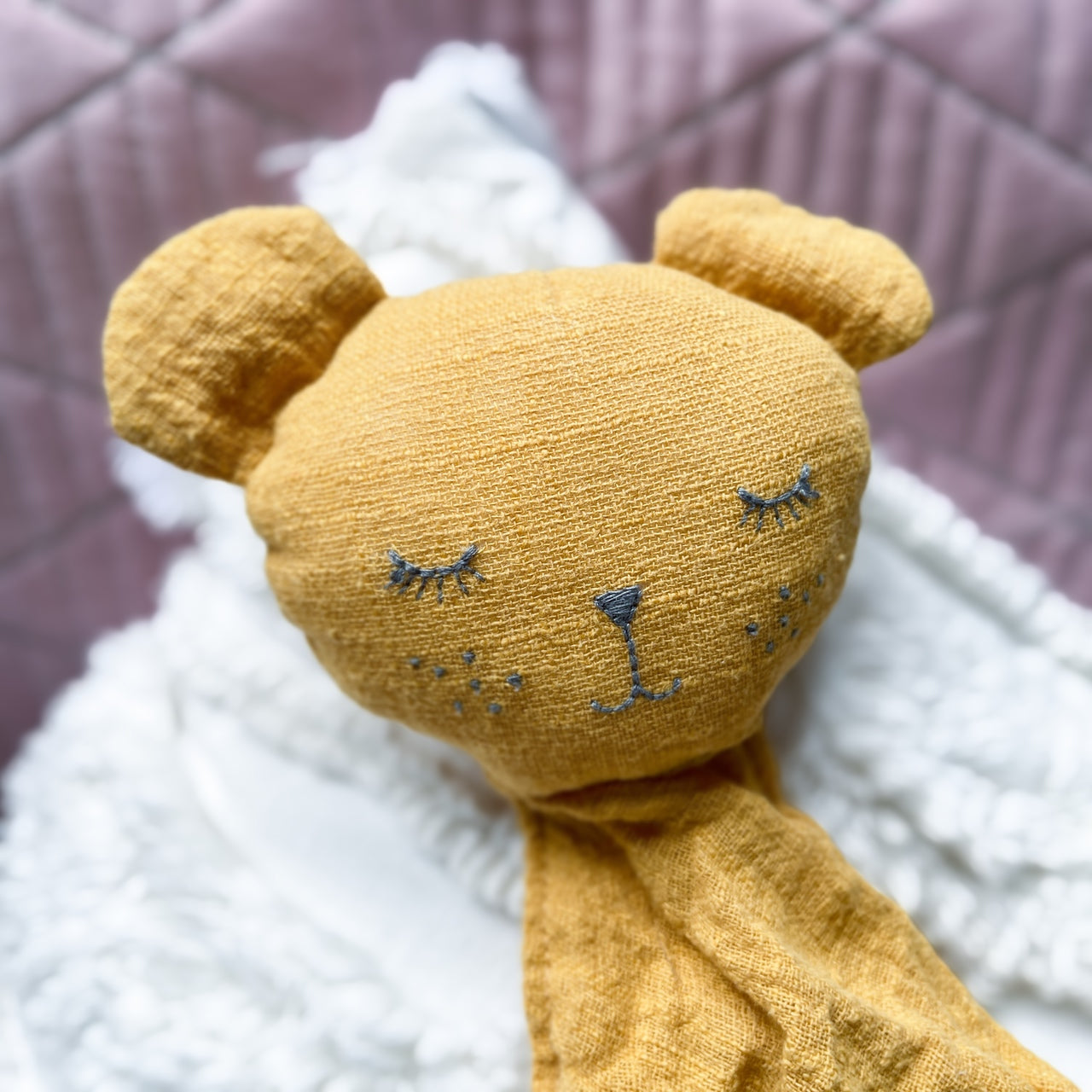 Mustard bear comforter baby toy.