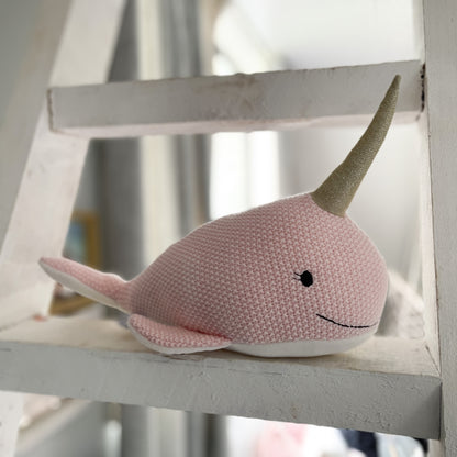 Pink Narwhal soft toy.