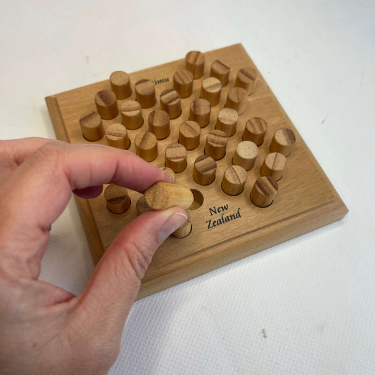 Wooden Solitaire peg puzzle. Hand made in New Zealand from beautiful New Zealand timber.