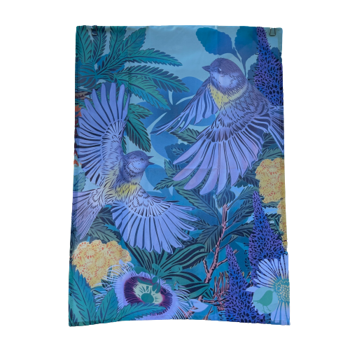 Beautiful tea towel by Flox design featuring a pair of Miromiro and flowers.