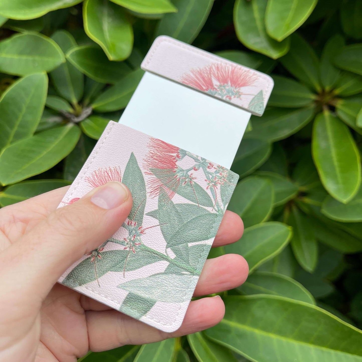 Pocket Mirror - Pohutukawa Flower print on a pale pink background.