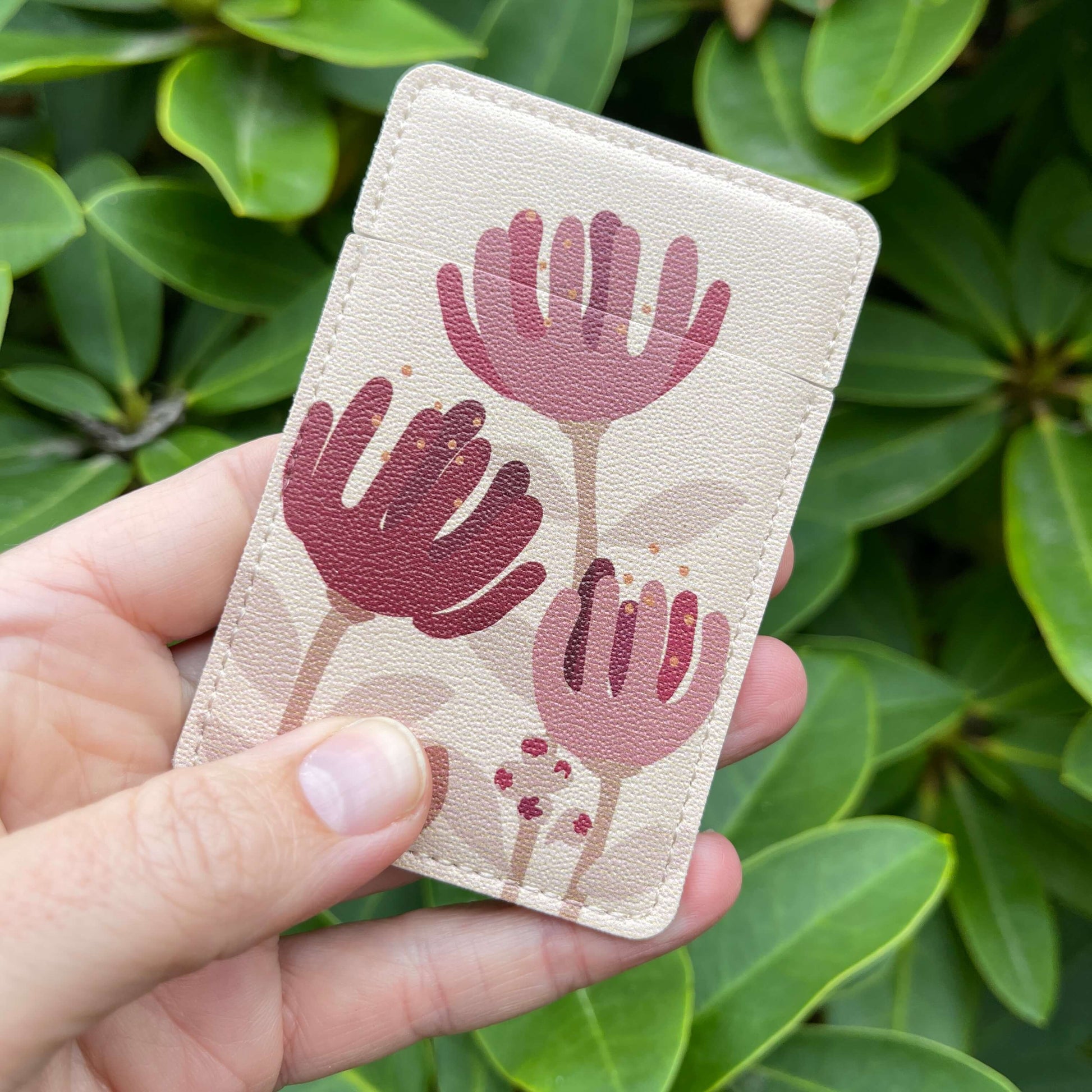 Pocket Mirror - Raw Pohutukawa Flower with demure brown background.