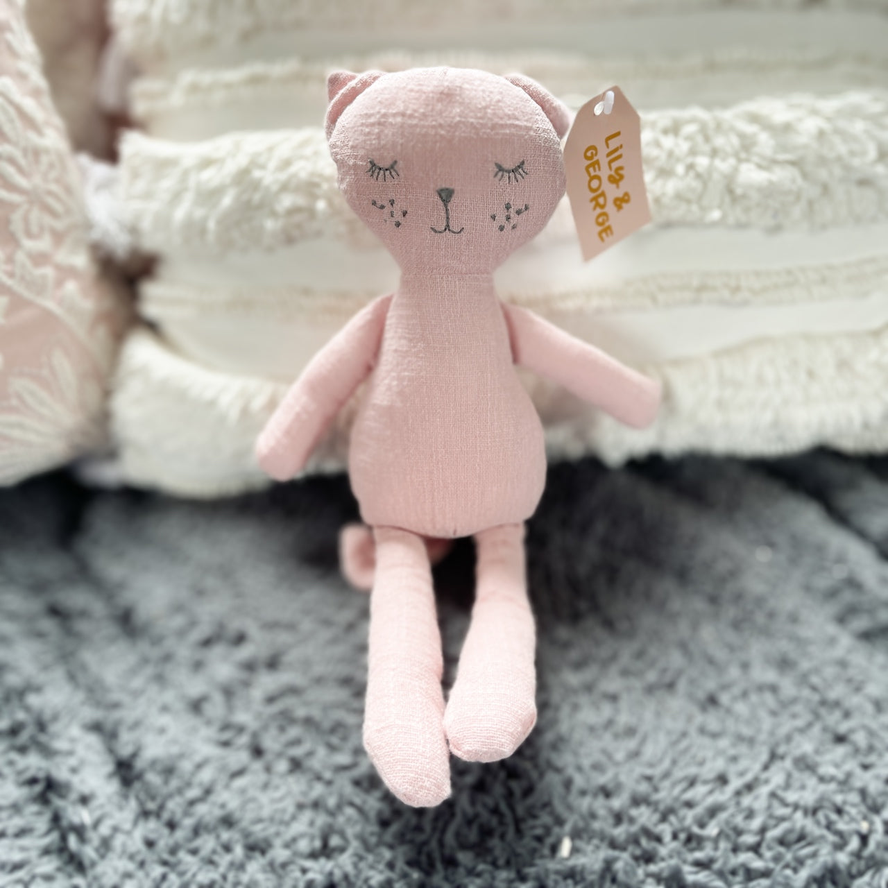 Rose coloured cat toy.
