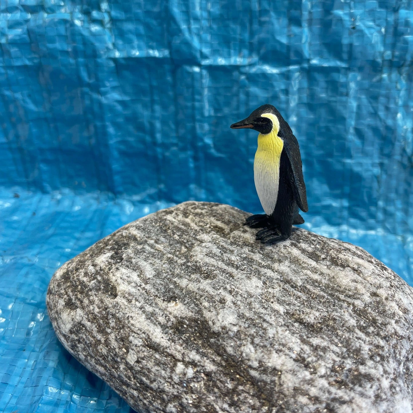 Mini penguin figurine.