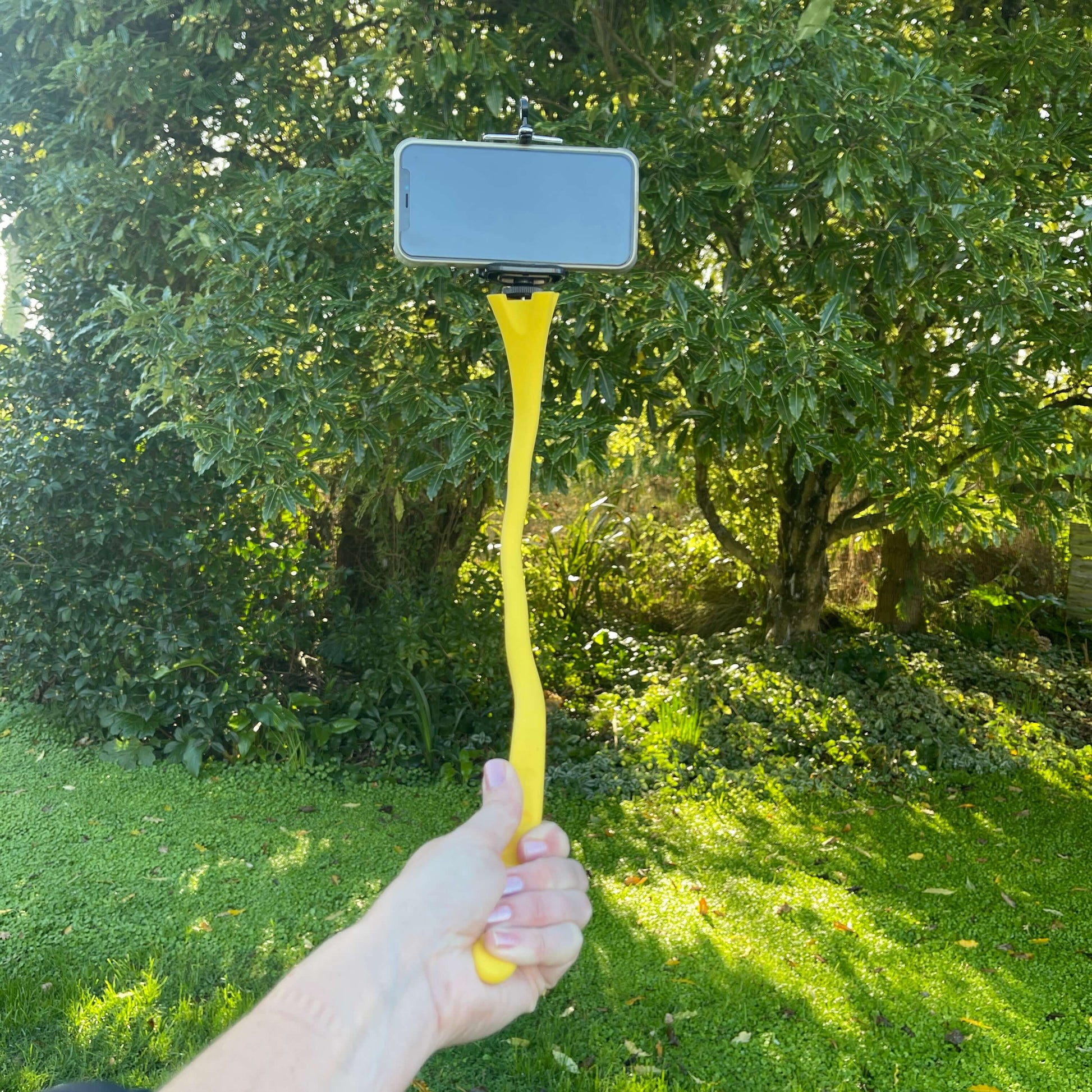 Bright yellow flexi selfie stick.