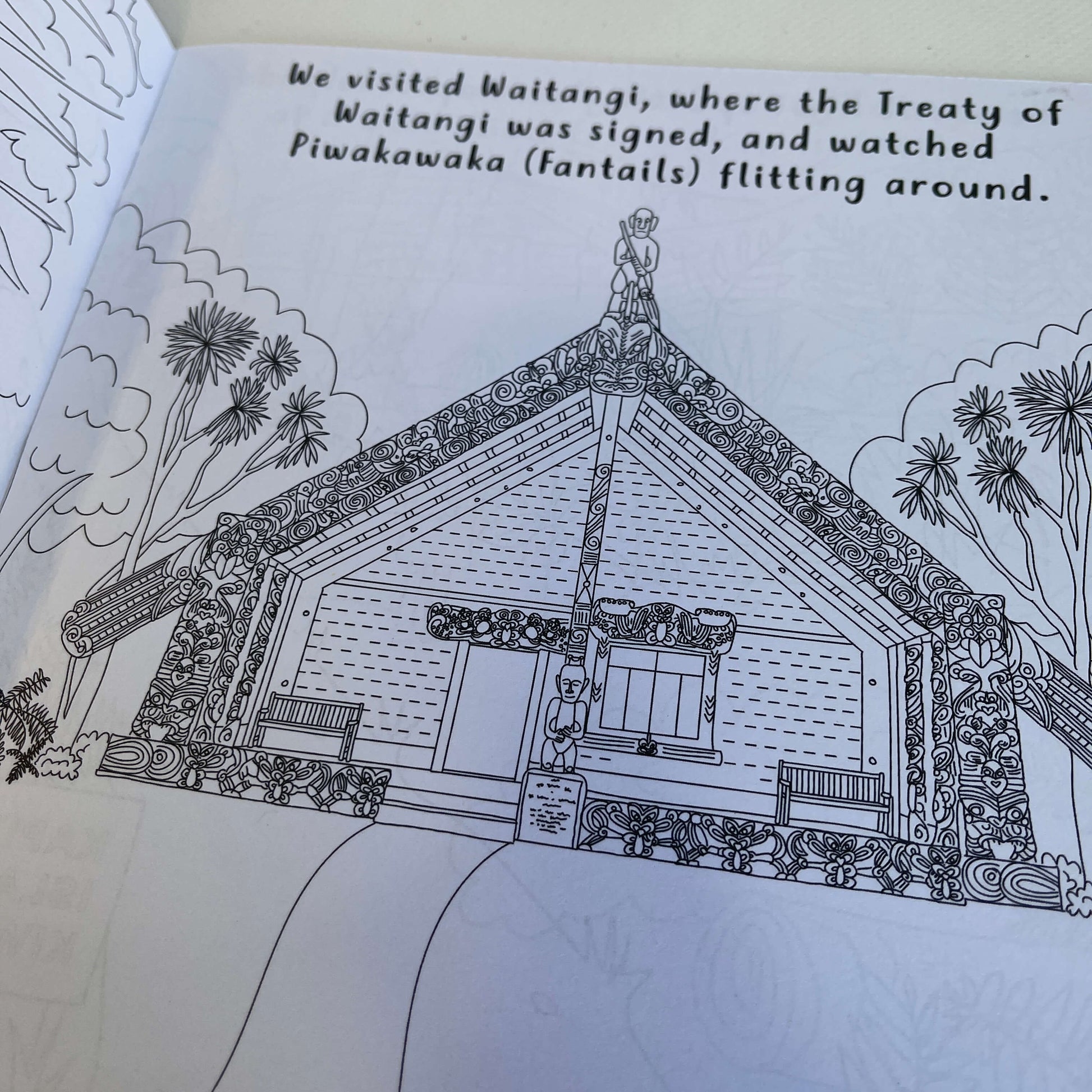 Page of a childrens colouring book showing a marae from Waitangi.