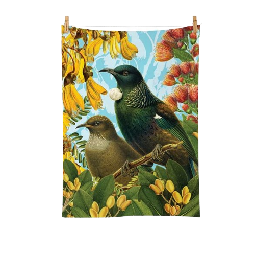 Tea towel with a Tui and flowers on it.