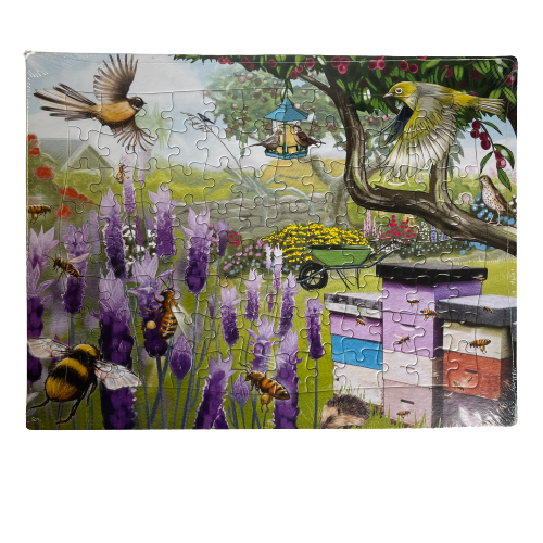 Jigsaw puzzle featuring beehives and native NZ birds.