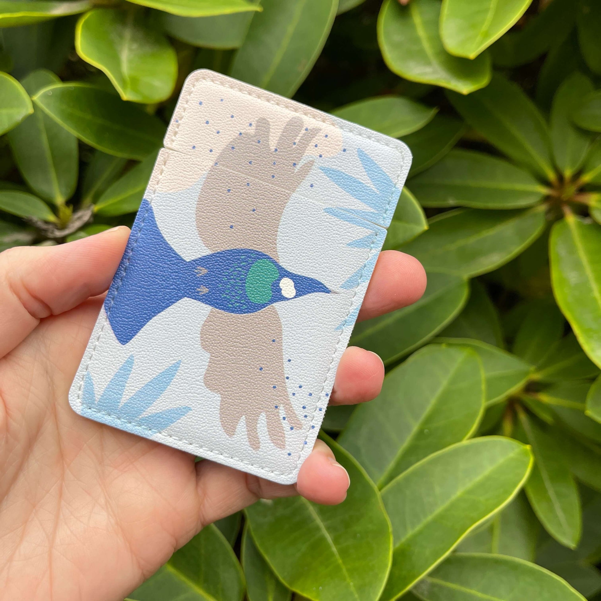 Pocket Mirror - Cut-out Tui with blue and grey accents.