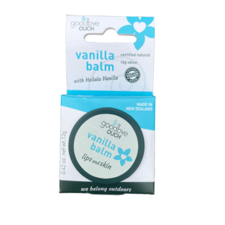 Vanilla balm tin in cardboard packaging by Goodbye Ouch.