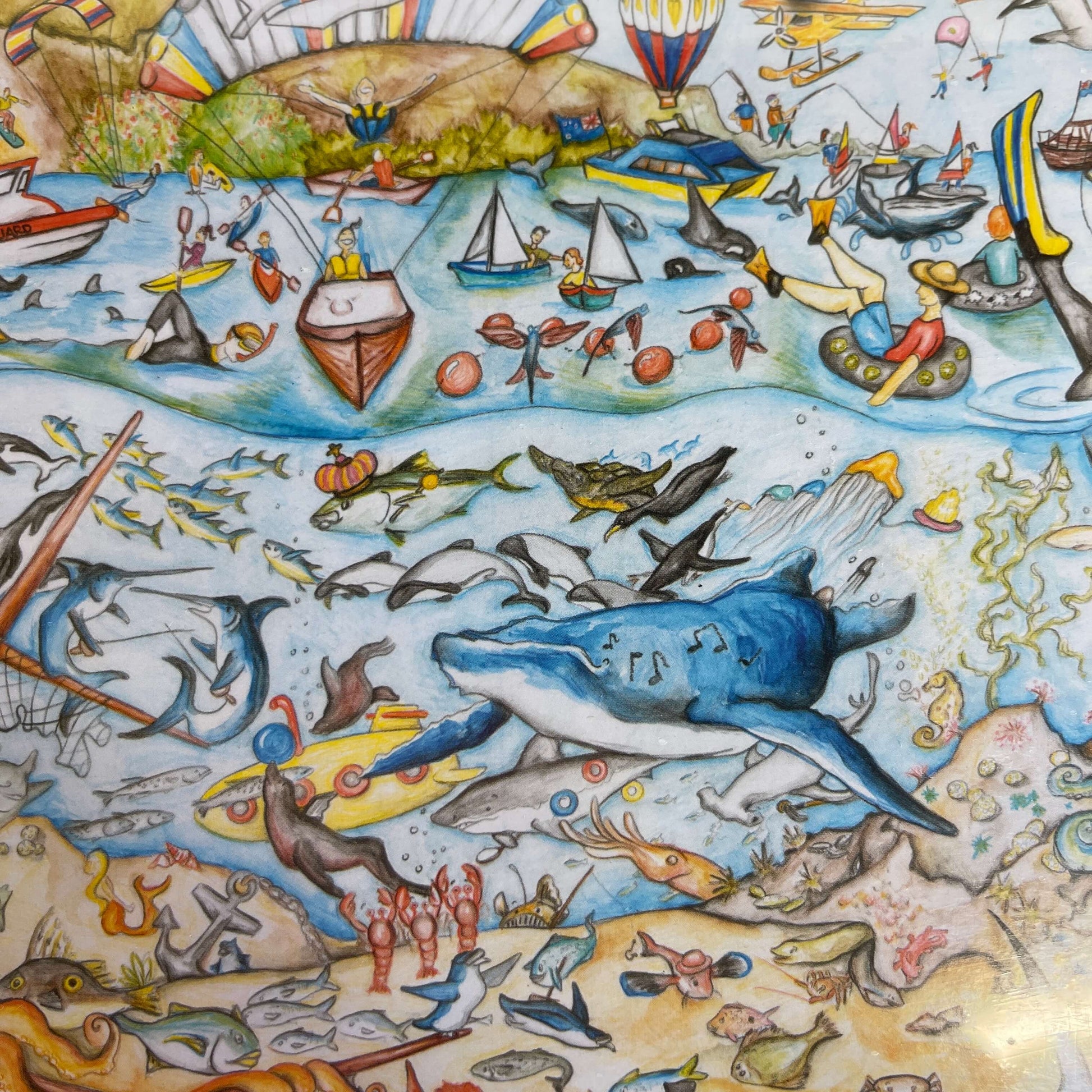 Close up of a Jigsaw puzzle with artwork featuring an underwater sea scene.