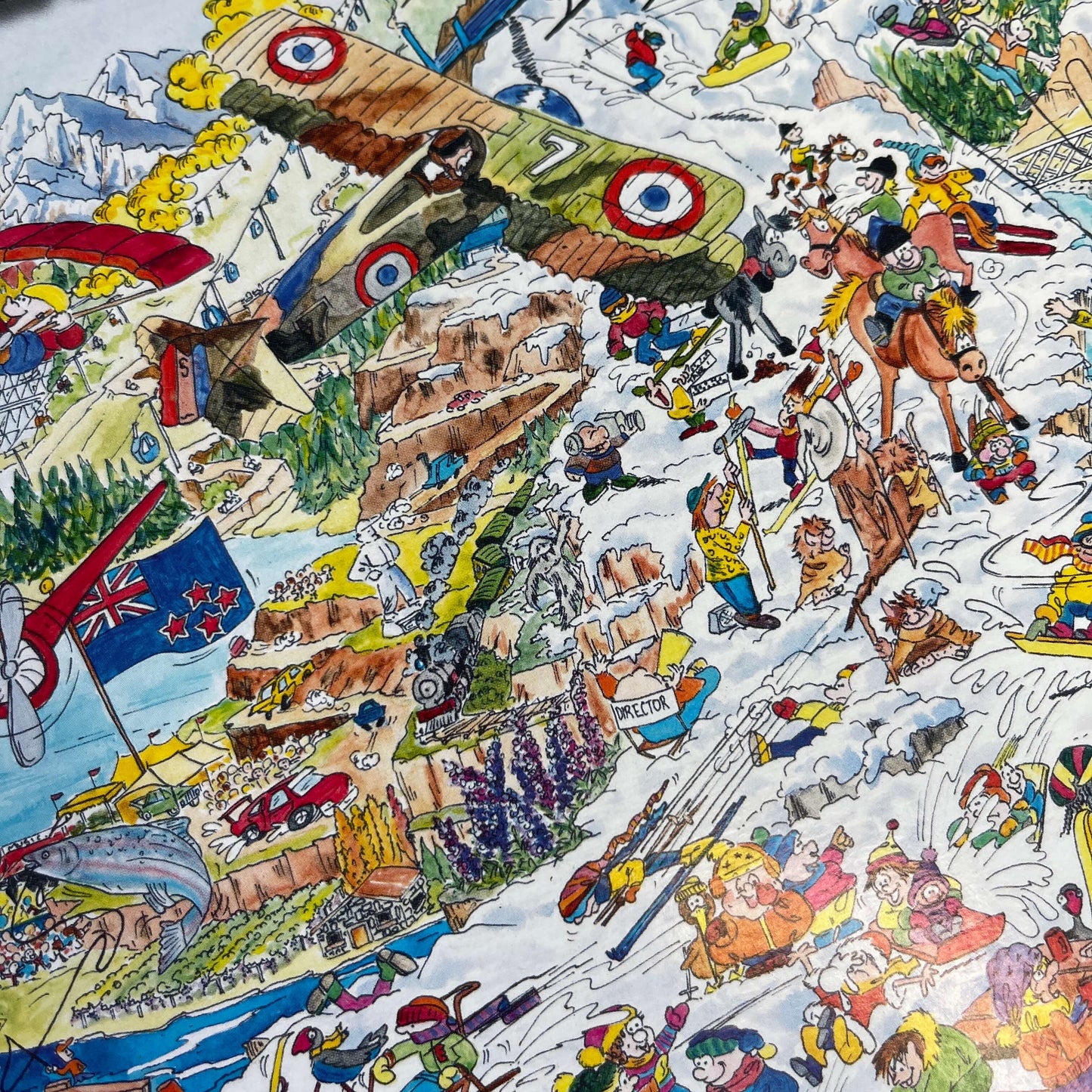 Close up of a Jigsaw puzzle with artwork featuring Queenstown & Wanaka.