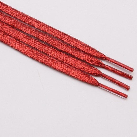 Red metallic shoelaces.