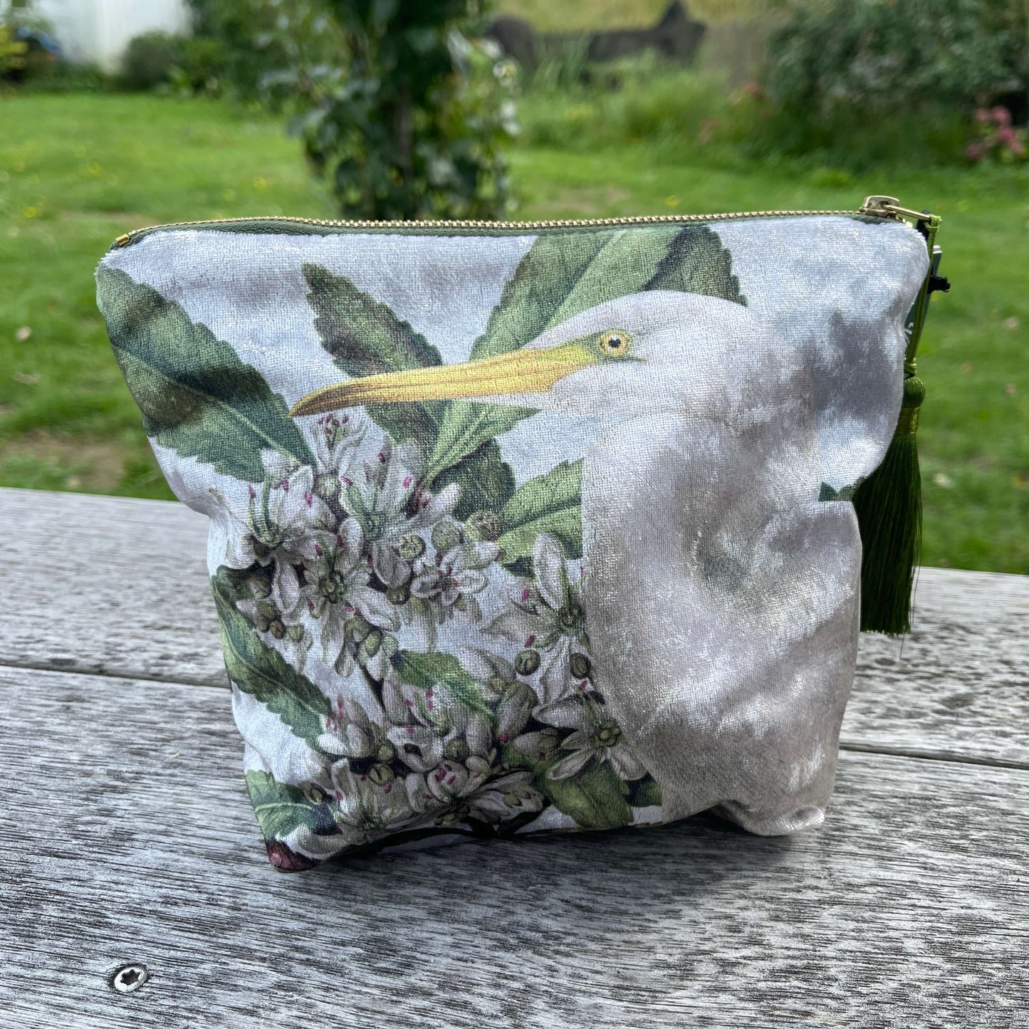 Velvet cosmetic bag with a white heron and botanical print.
